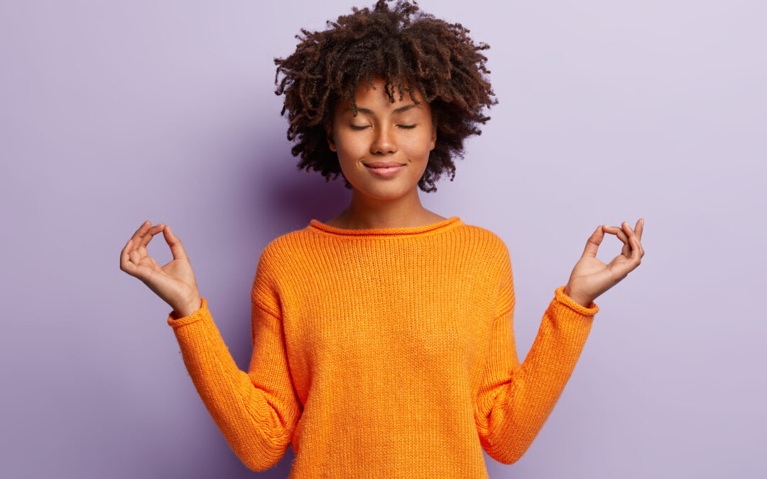Woman with eyes closed feeling calm